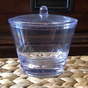 small plastic container with lid